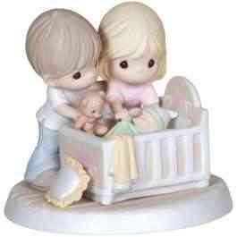 mom-and-dad-standing-over-baby-crib-figurine-gifts-for-mothers-day-teachworkoutlove.com