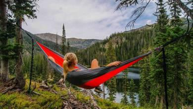 woman-in-hammock-with-mountains-weekend-life-teachworkoutlove.com