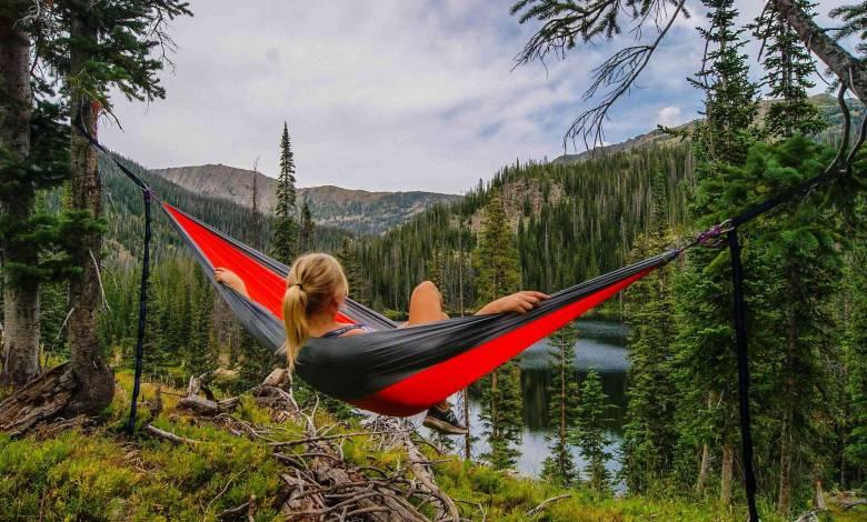 woman-in-hammock-with-mountains-weekend-life-teachworkoutlove.com