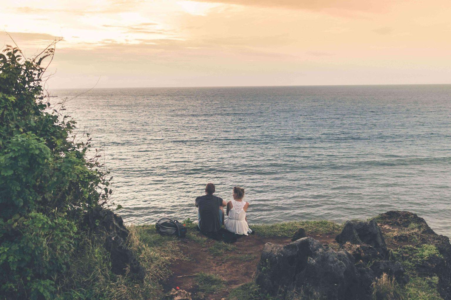 couples-meditating-by-the-ocean