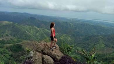 mom-reaching-her-fitness-goals-quicker-on-top-of-mountain