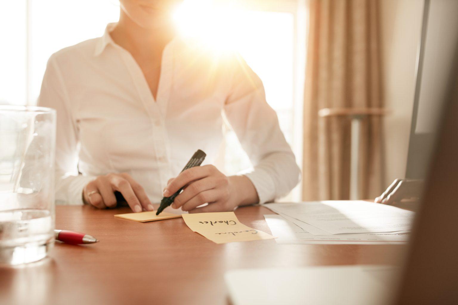 business woman writing