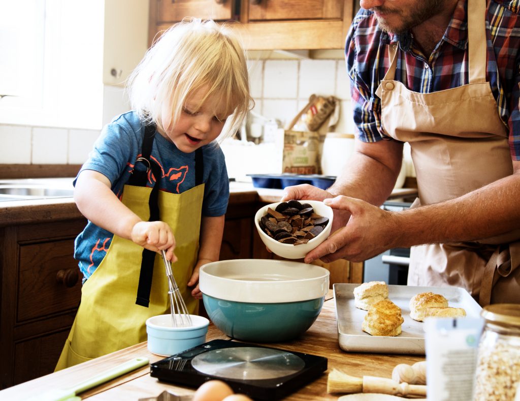 non-toy gift idea child baking with parent