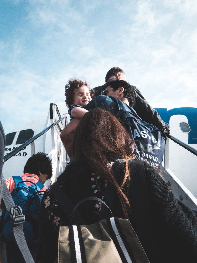 kids-traveling-on-airplane