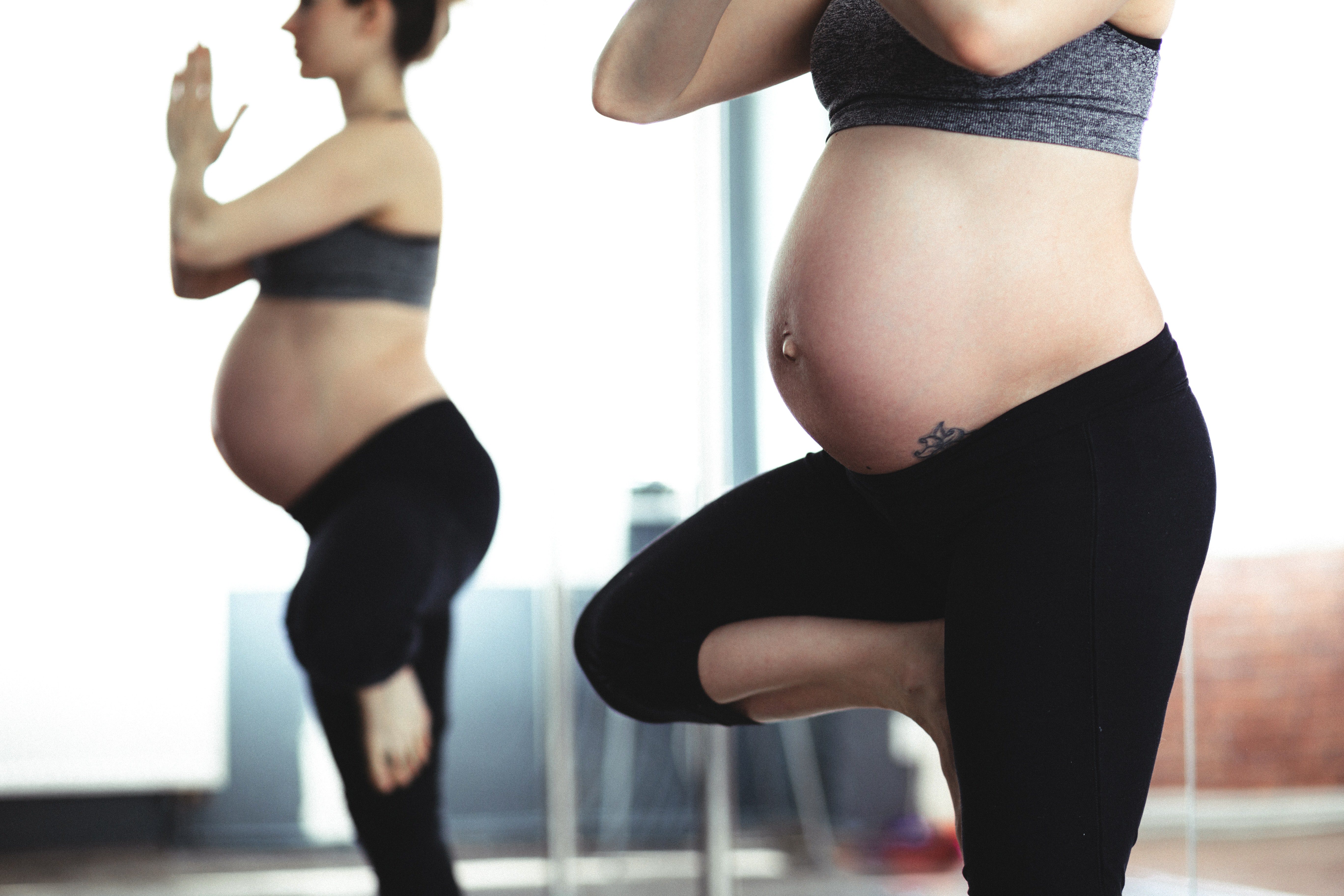 Future mom doing Yoga.