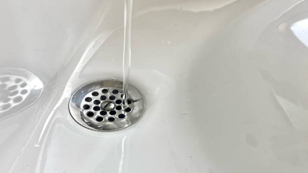 cleaning up hair on the drain