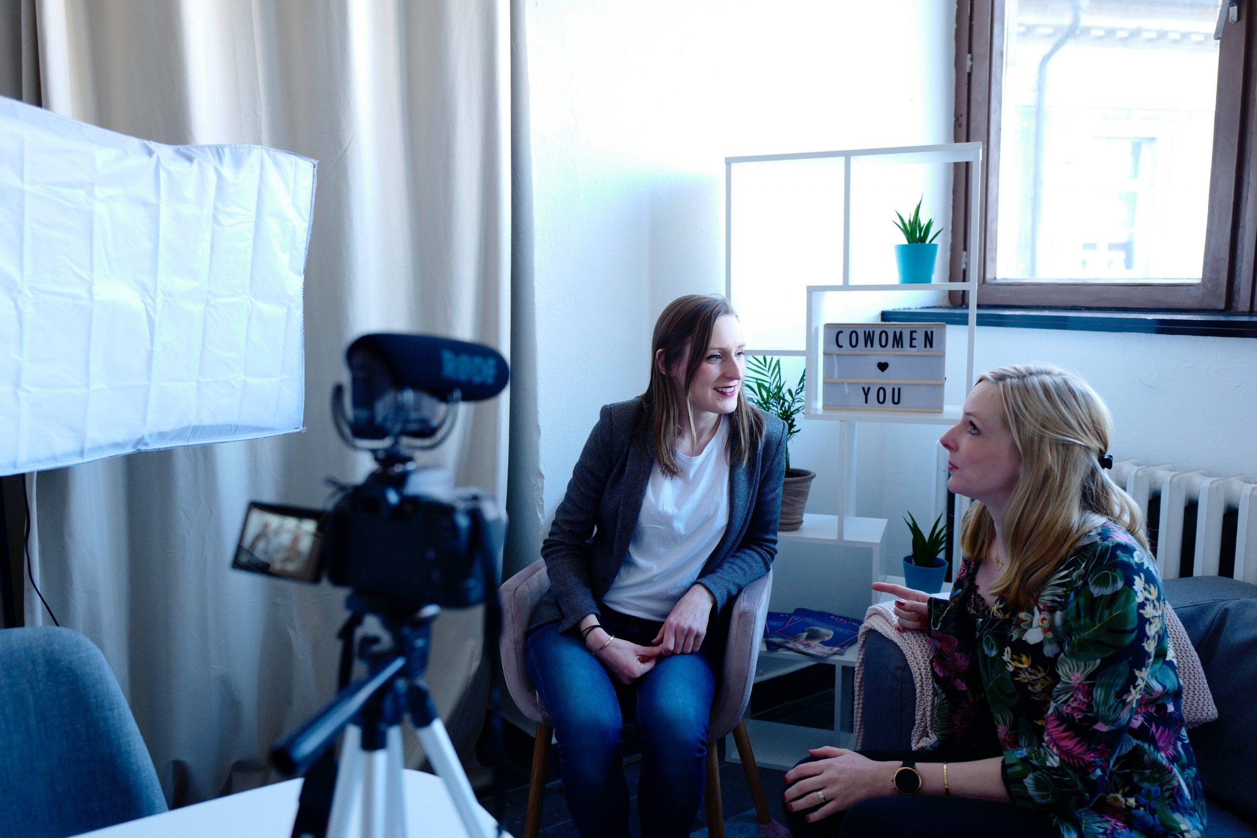 women doing an interview for vlogging