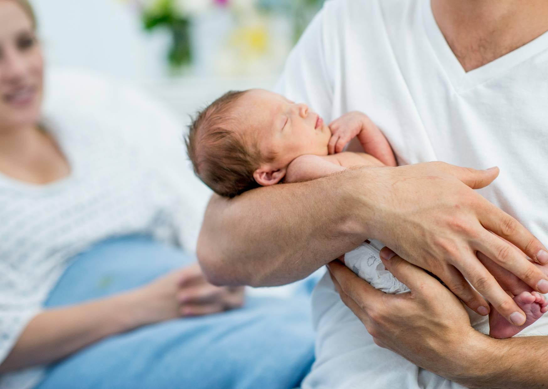 new dad with baby