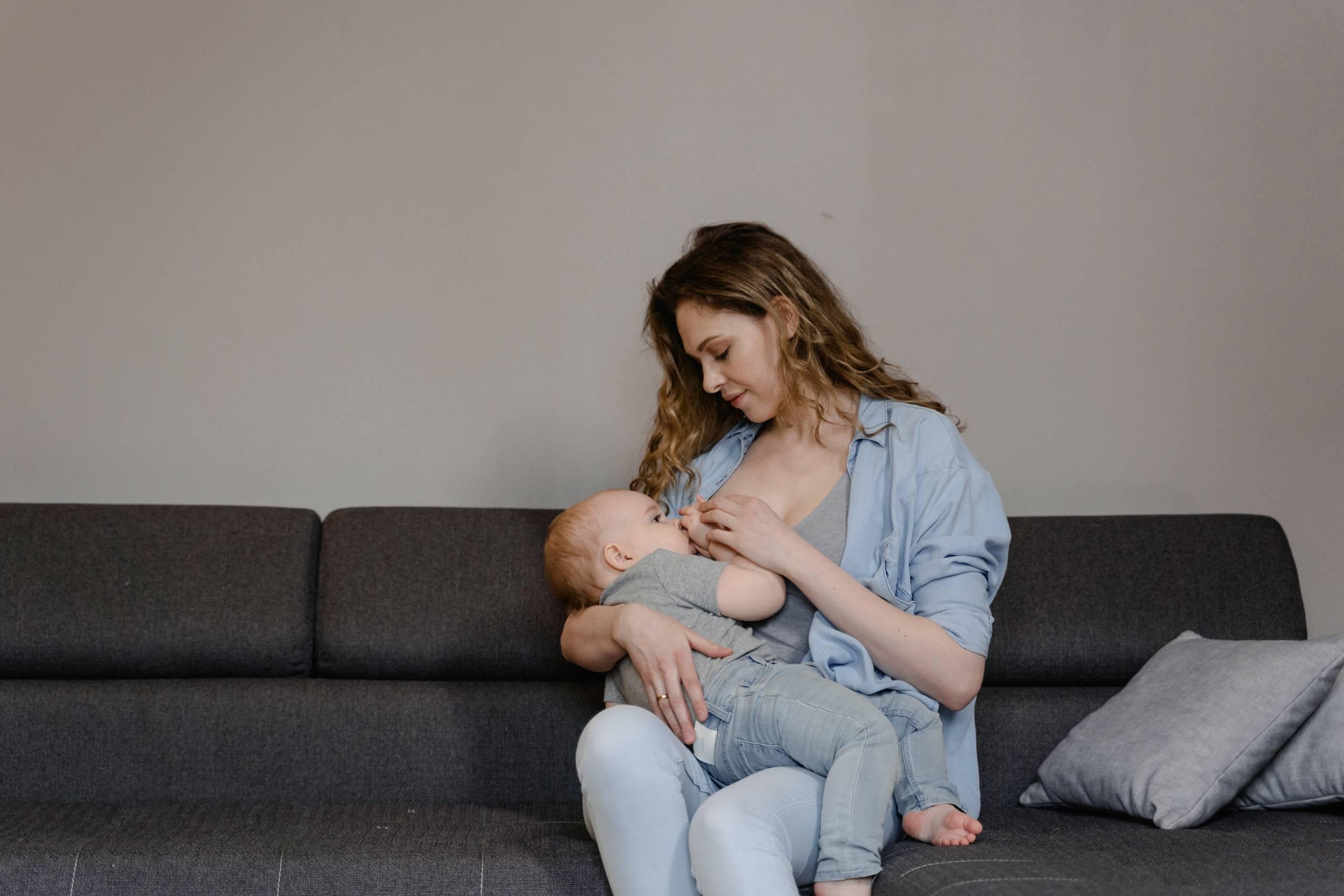 Mom breastfeeding baby
